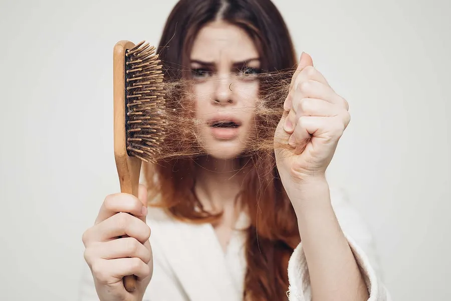 rambut ikal rontok
